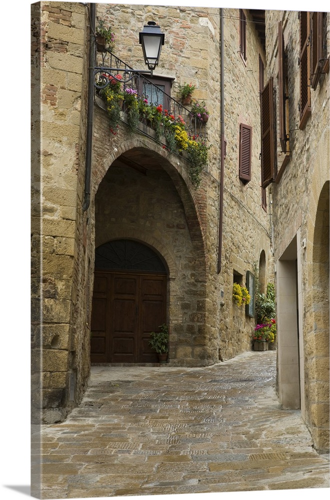 Italy, Montichiello. Houses along a lane in a medieval village.