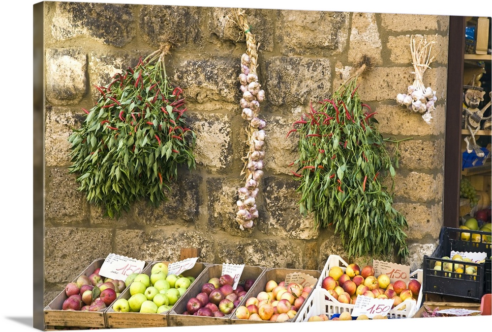 Italy, Orvieto. Fruit displayed for sale out side of small shop.