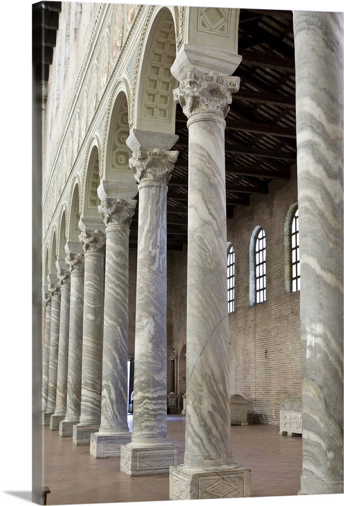 Europe, Italy, Ravenna.  A row of marble columns in the Church of St. Apollinare.