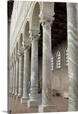 Italy, Ravenna. A row of marble columns in the Church of St. Apollinare