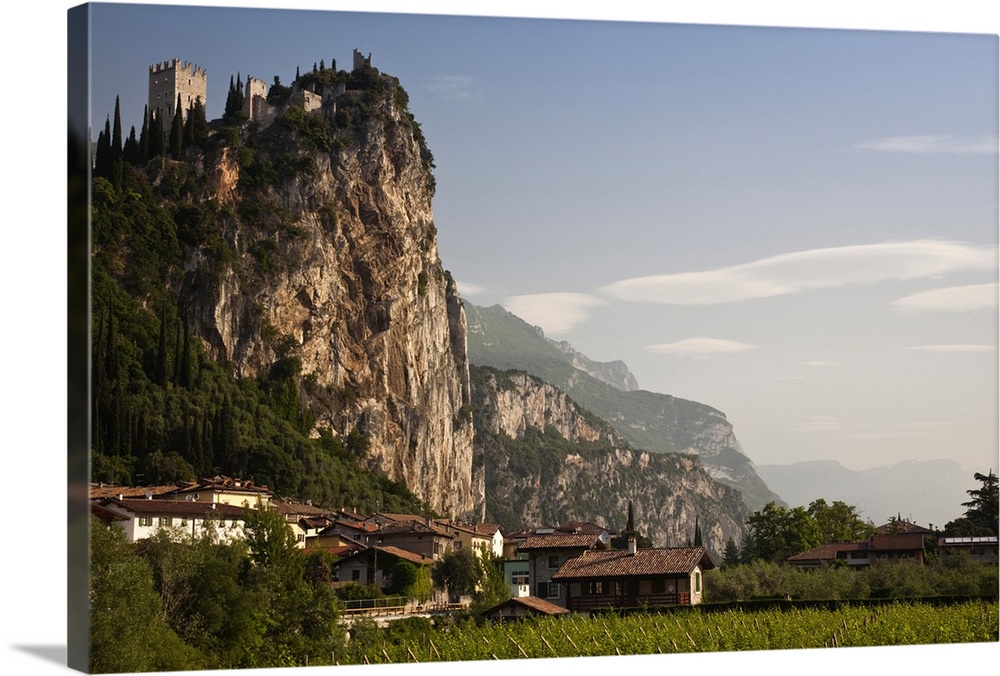 Italy, Trento Province, Arco. Mountaintop Castello di Arco, view from Sarca River, morning.