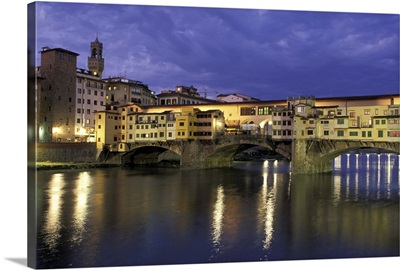 Italy, Tuscany, Florence. Evening view of Ponte Vecchio from Arno River