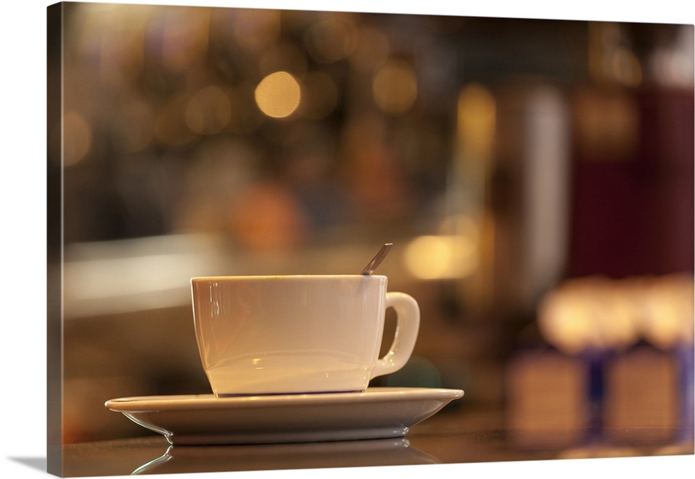 Italy, Venice. A cappuccino on the country of a cafe.