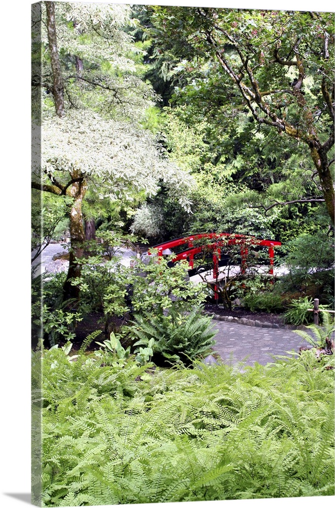 Red footbridge in Japanese Garden at Butchart Gardens Victoria British Columbia Canada