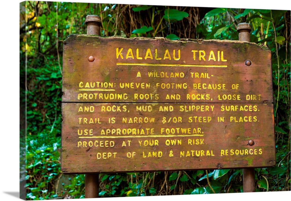 Kalalau Trail sign at the Ke'e Beach trailhead, Na Pali Coast, Island of Kauai, Hawaii USA