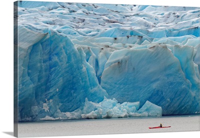 Kayaker Exploring Grey Lake And Massive Grey Glacier, Chile, South America