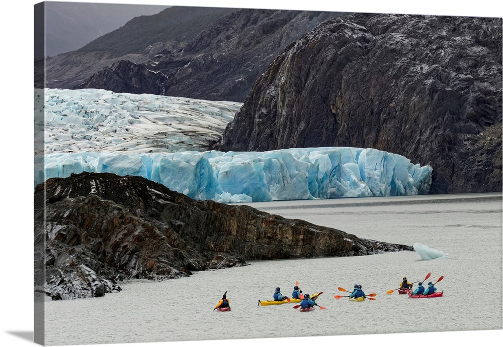 Kayaker's exploring Grey Lake and Grey Glacier, Torres del Paine National Park, Chile, South America. Patagonia, Patagonia.