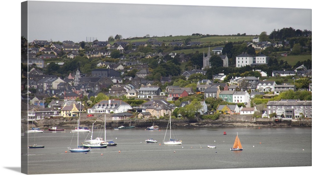 Kinsale Ireland with colorful  homes on the hillside and boats in the water