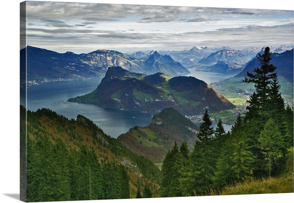 Lake Lucerne surrounded by the Alps and rural countryside viewed from worlds steepest cog train on descent from Pilatus Mo...