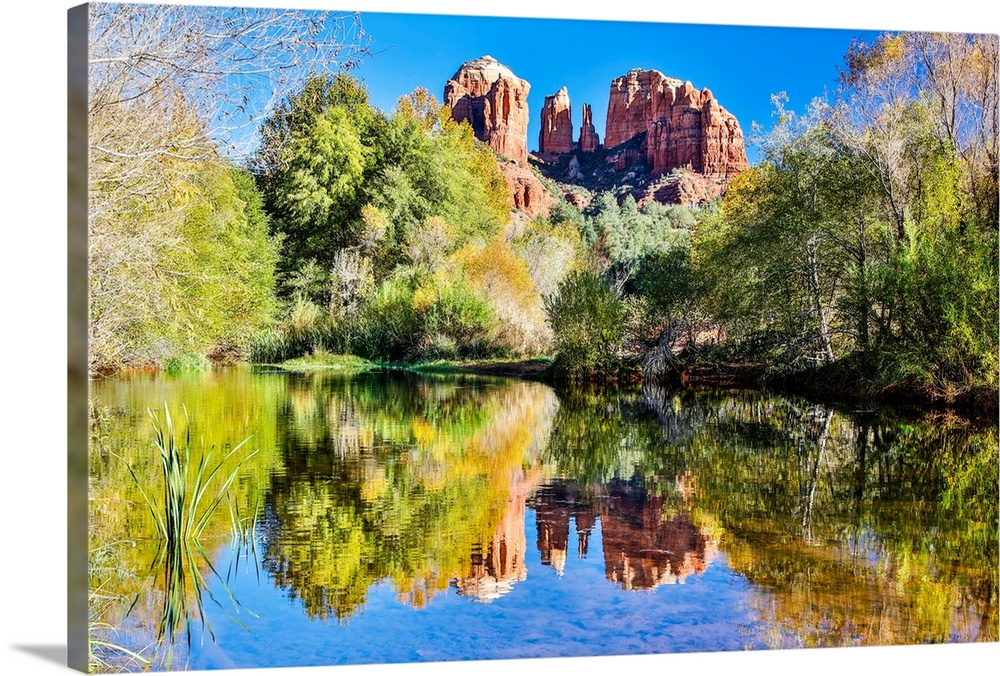 United States, Arizona, Sedona, Red Rock Crossing, Landscape of Rock and Trees Reflecting in the Water.