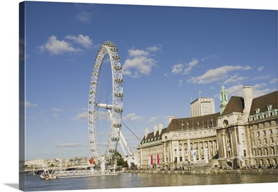 London Eye Ferris Wheel On The Banks Of The Thames River