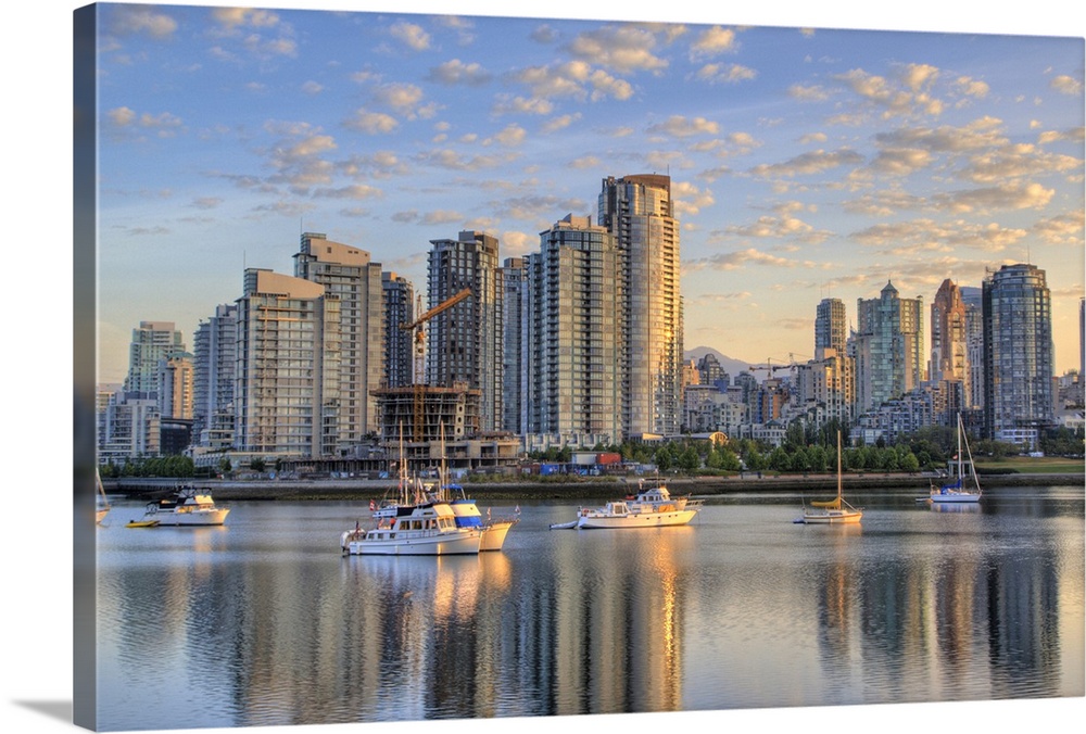 Looking across False Creek at the skyline of Vancouver British Columbia at sunrise