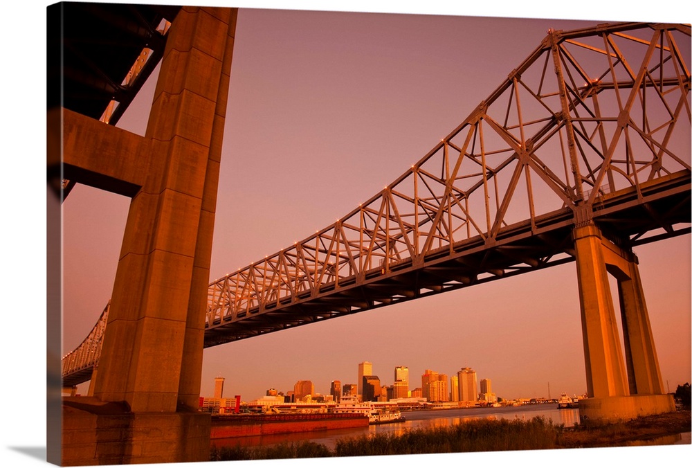 USA, Louisiana, New Orleans. Skyline from the Greater New Orleans Bridge and Mississippi River, dawn.