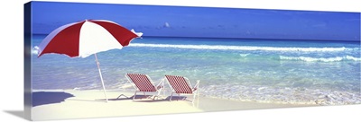 Lounge Chairs and Umbrella on the Beach in Paradise Island, Bahamas