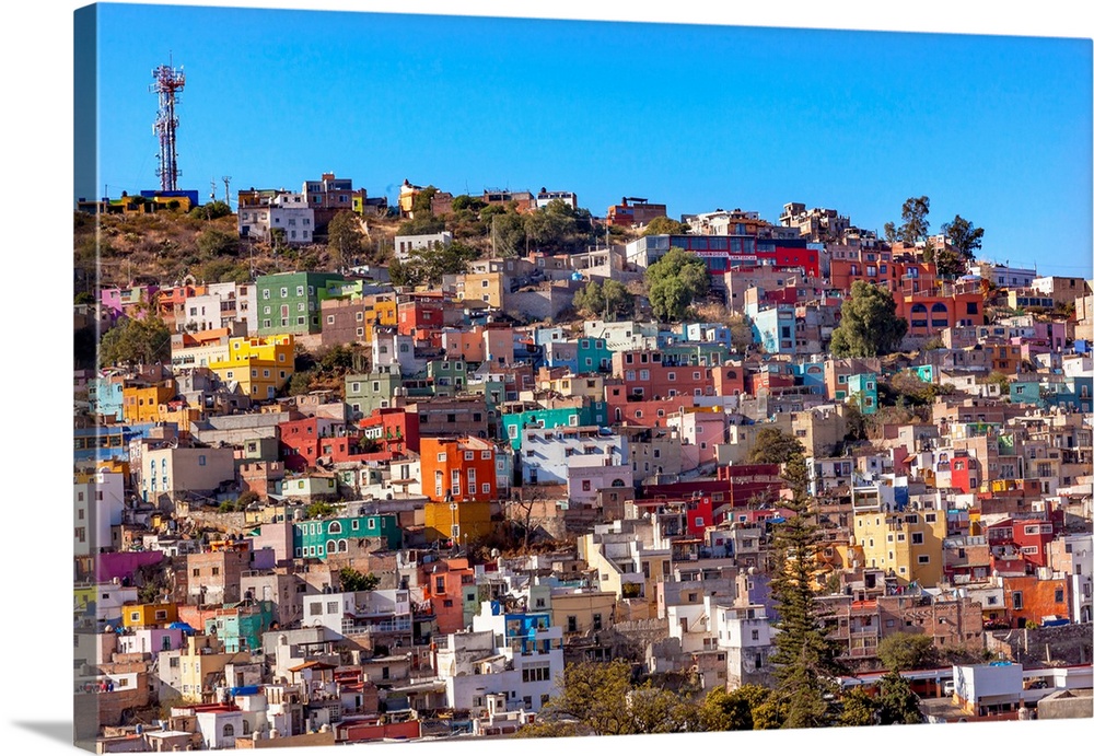 Many Colored Orange Blue Red Houses of Guanajuato Mexico.