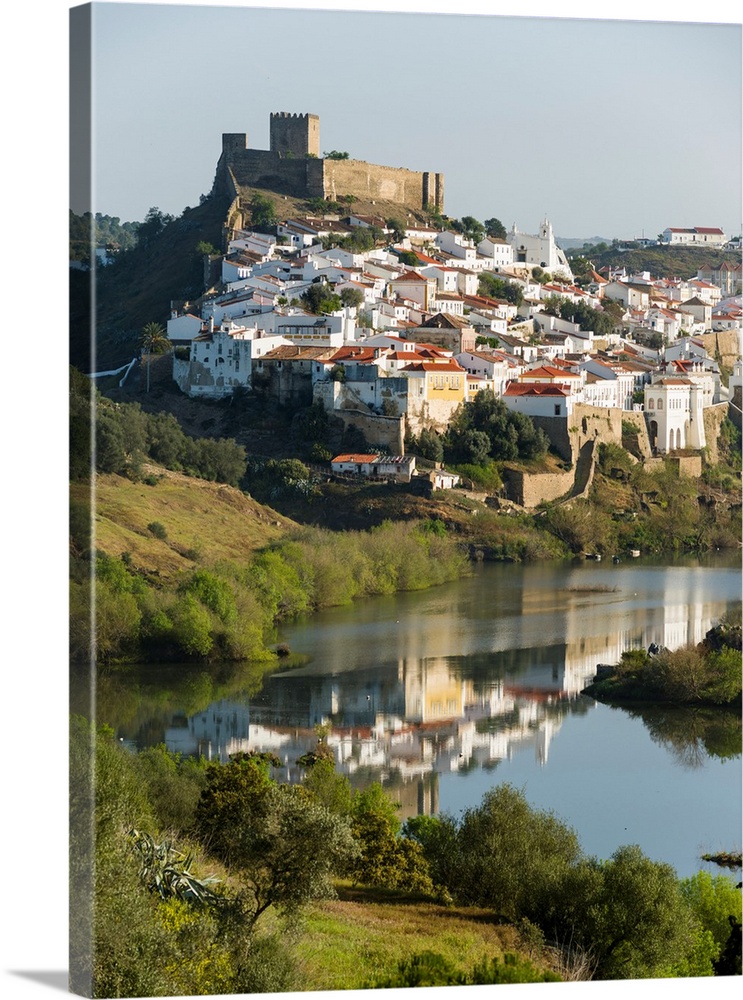 Mertola on the banks of Rio Guadiana in the Alentejo. Europe, Southern Europe, Portugal, March.