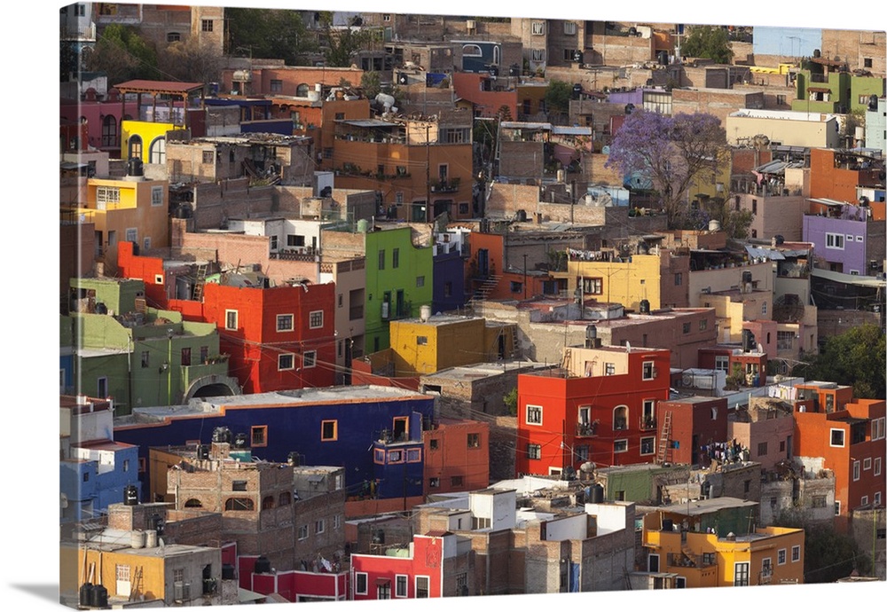 Mexico, Guanajuato. Colorful homes line the streets of this hilltown.