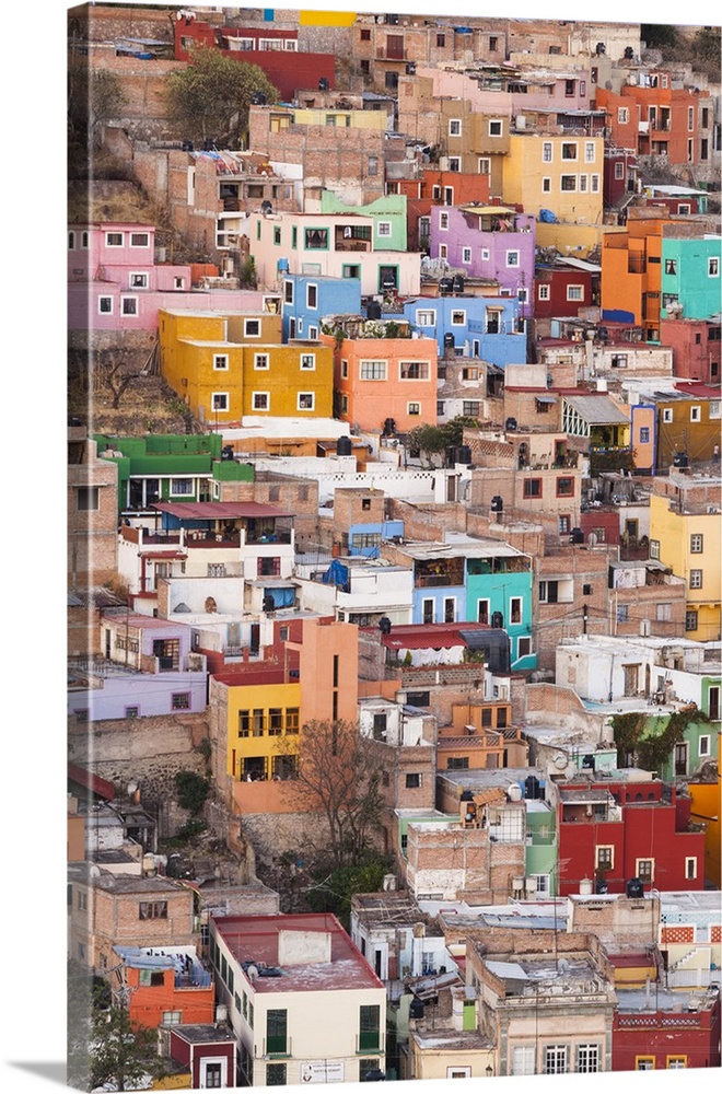 Mexico, Guanajuato. Colorful homes perch on the hillside of this Mexican town.