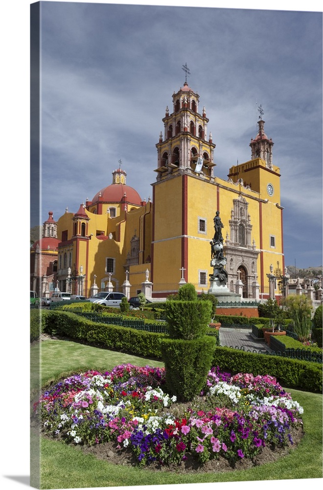Mexico, Guanajuato.  Gardens welcome visitors to the colorful town of Guanajato. The Basilica of our Lady of Guanajuato is...