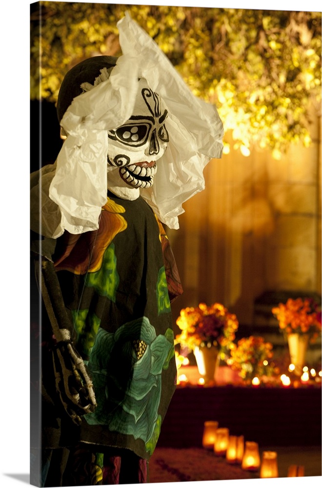 North America, Mexico, Oaxaca Province, Oaxaca, Pantheon San Miguel Cemetery, giant puppet greets visitors during annual D...