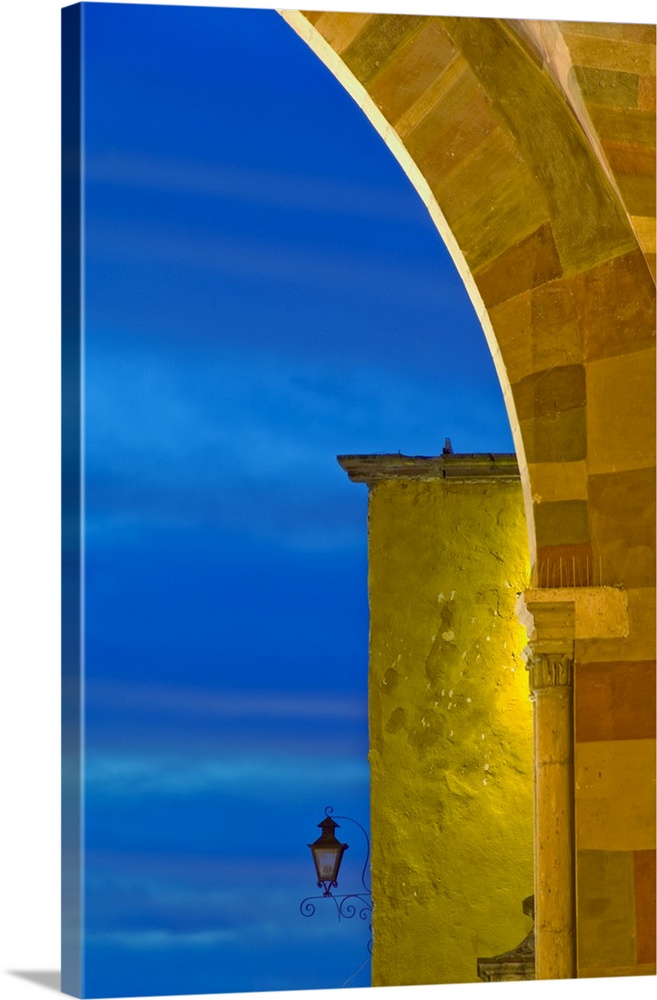 Mexico, San Miguel de Allende, evening sky and light on church archway.