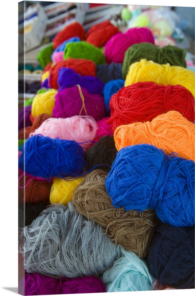 North America, Mexico, Guanajuato state, San Miguel de Allende. Yarn on display at the local Tuesday market.