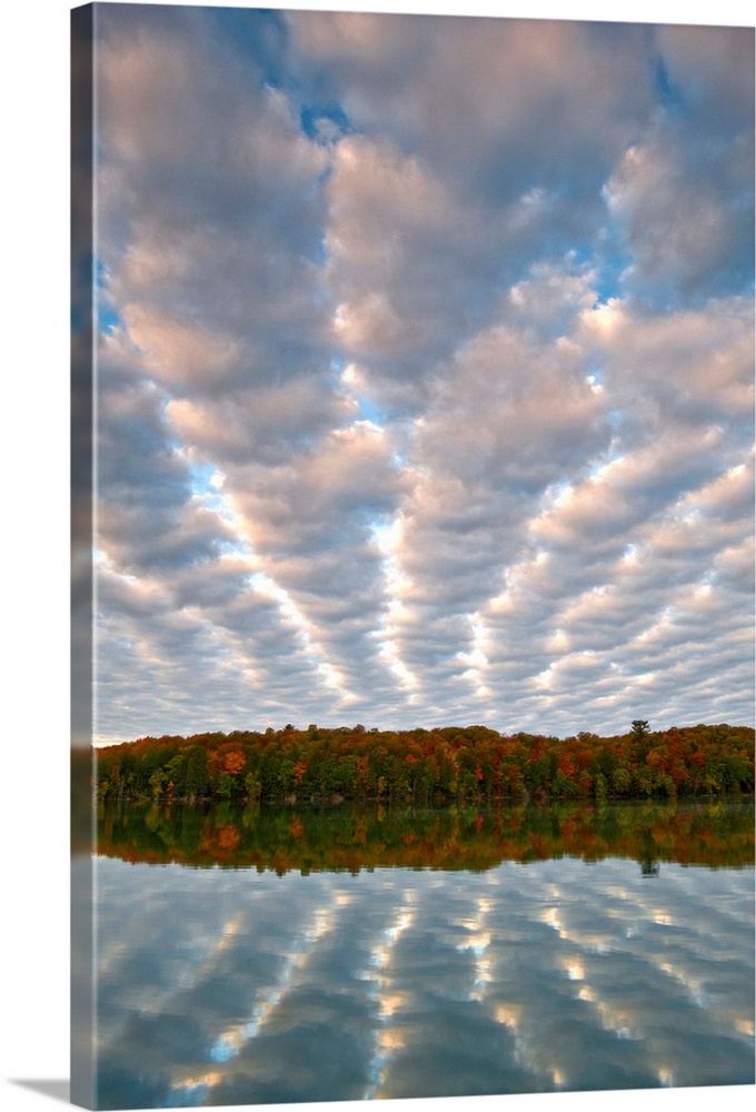 USA, Michigan, Upper Peninsula. Clouds over Pete's Lake in autumn.