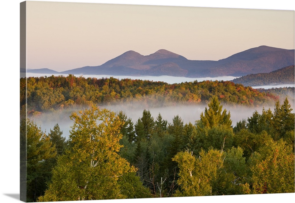 Morning fog and the Percy Peaks as seen from the fire tower at Milan Hill State Park in Milan, New Hampshire.