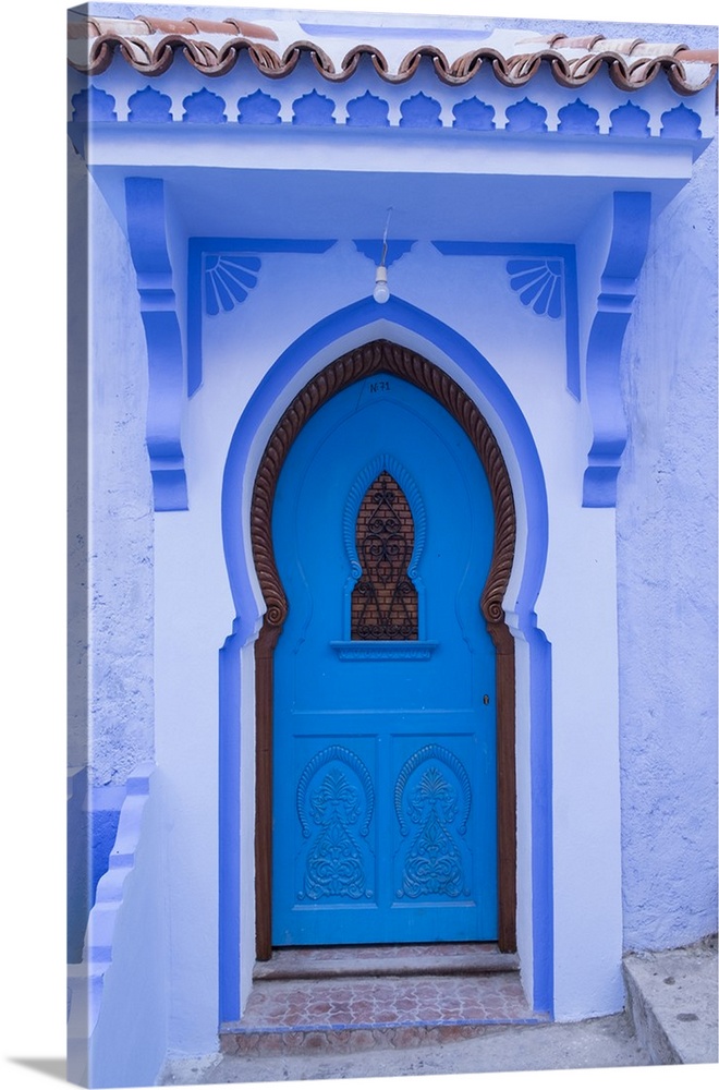 Morocco, Chefchaouen. A traditional door and entrance to a home in the village.