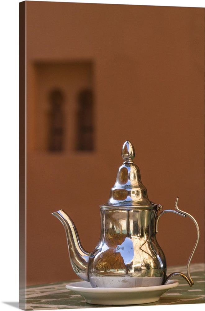 Morocco, Dades Gorge. Tea service reflects the colors of the steep walls surrounding the hotel.