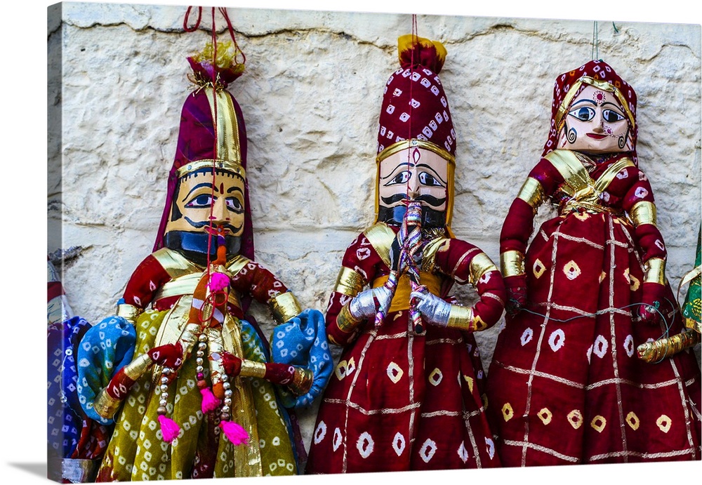 Jaisalmer, Rajasthan, India. Mughal paper mache dolls and puppets wearing colorful, traditional, costumes