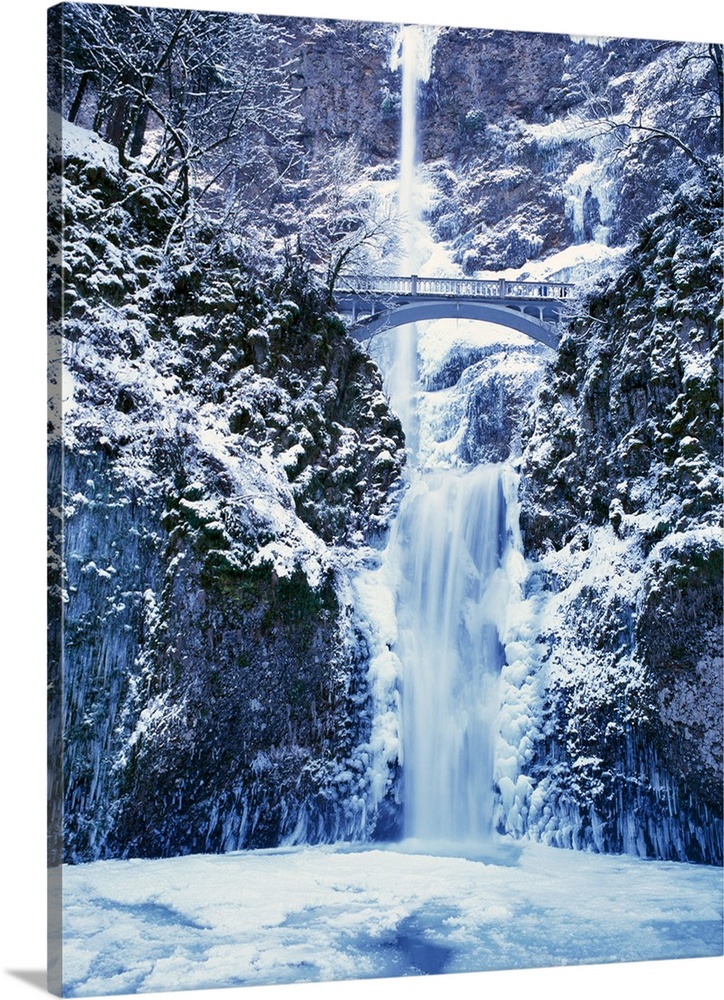 Multnomah Falls with snow and ice, winter in Columbia River Gorge.