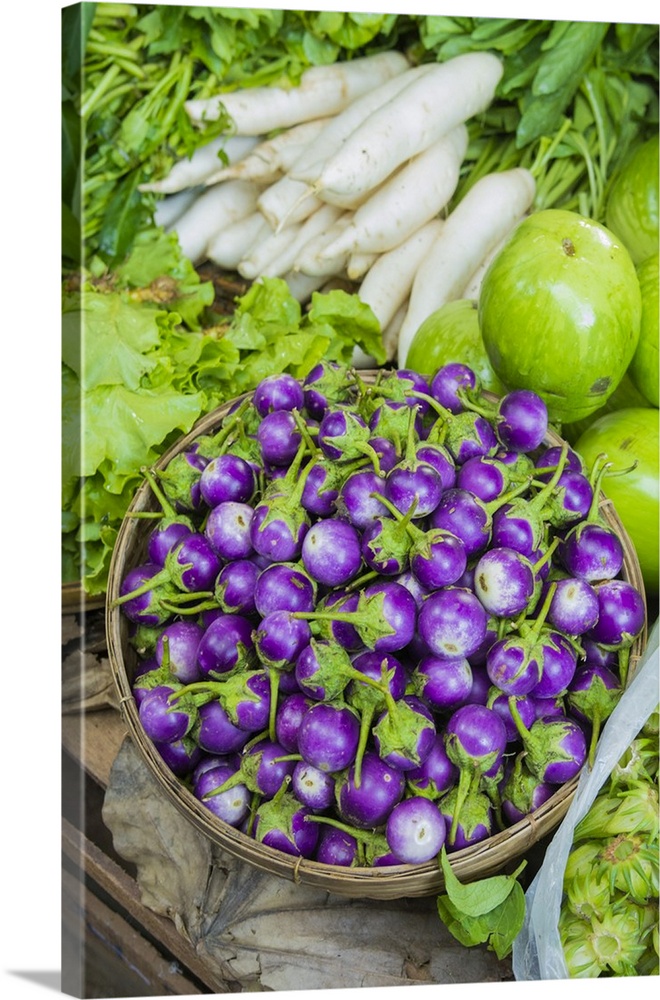 Myanmar. Bagan. Nyaung U. Market. Eggplant for sale in the market.