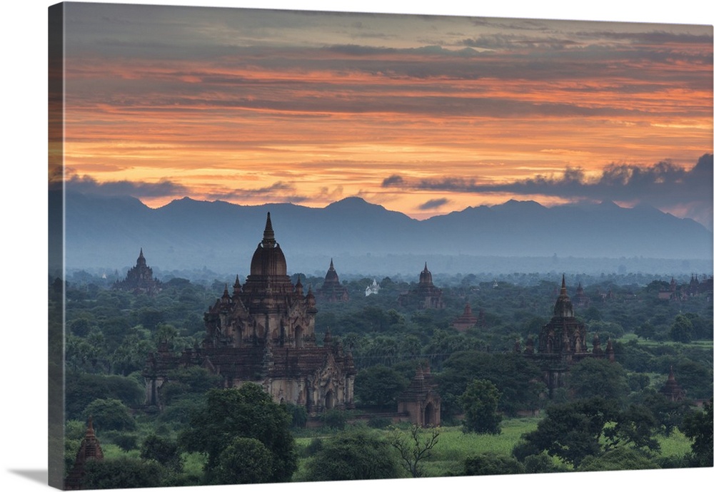 Myanmar, Bagan. Sunrise over stupas on the plains of Bagan.