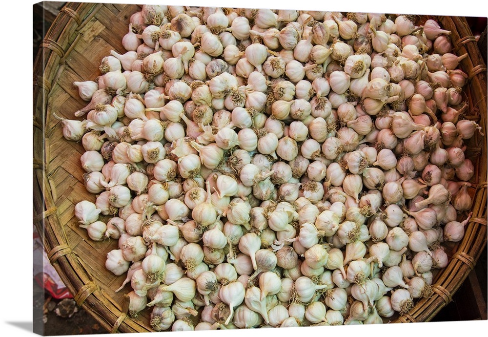 Myanmar. Mandalay. Garlic for sale in an open air market.