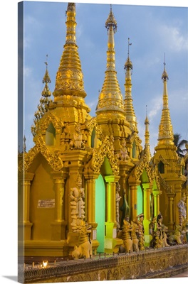 Myanmar, Yangon, Shwedagon Pagoda, Golden spires gleam at twilight
