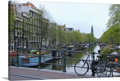 Netherlands, Amsterdam, Prinsengracht canal with the Westerkerk in the distance