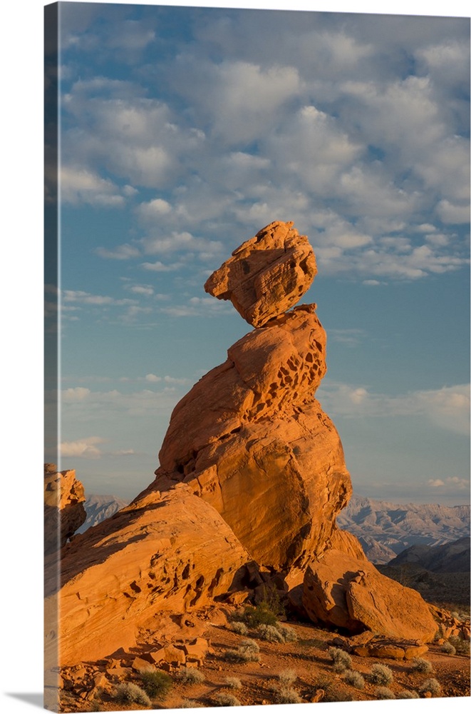 North America, USA, Nevada, Valley of Fire State Park.  Sunset on Balancing Rock with clouds in the background, Valley of ...