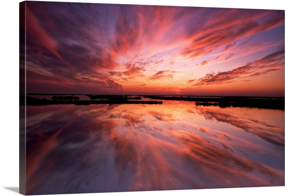 USA, New Jersey, Cape May. Sunset reflection on water.