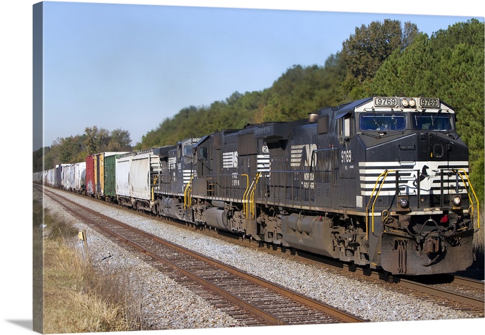Norfolk Southern Railway locomotive traveling along Highway 72 west of Mussel Shoals, Alabama, USA.