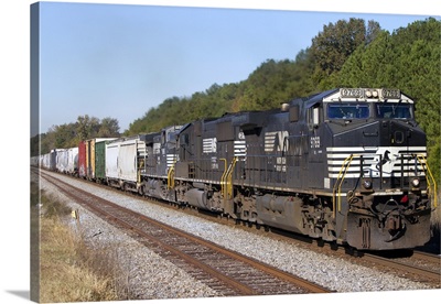 Norfolk Southern Railway locomotive traveling along Highway 72, Alabama