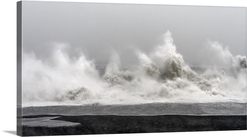 North Atlantic coast near Vik y Myrdal during a winter storm with heavy gales. .