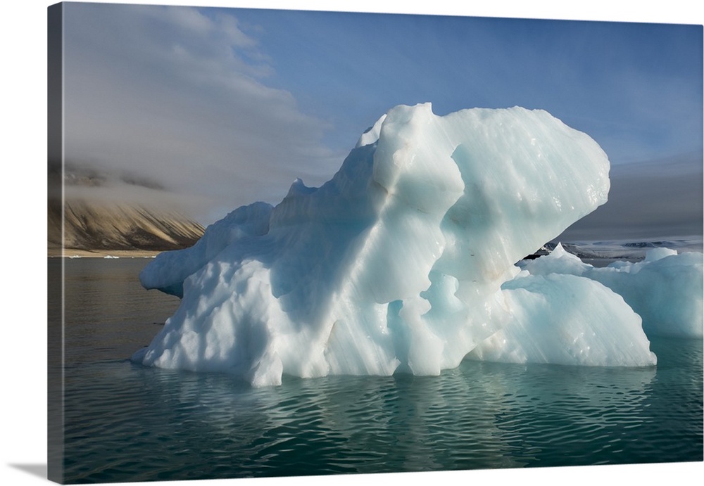 Norway, Barents Sea, Svalbard, Nordaustlandet, Palanderbukta, Zeipelodden. Large iceberg.