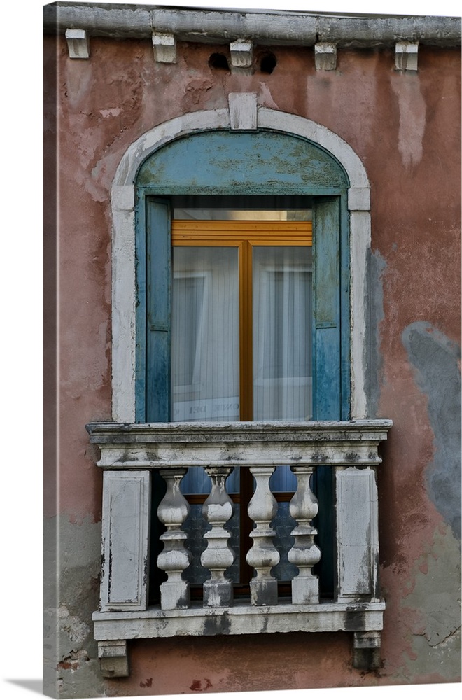 Old and colorful doorways and windows in Venice Italy.