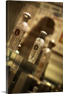 Old perfume bottles display in Musee du Parfum, Paris, France