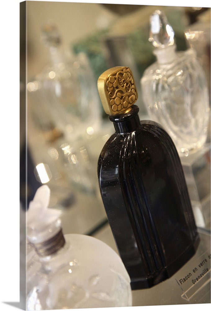 Old perfume bottles display in Musee du Parfum. Paris. France