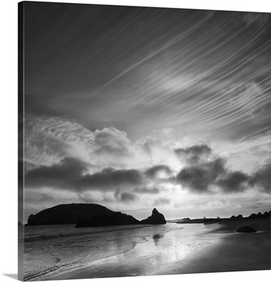 Oregon, Harris Beach State Park. Black and white image of sunset at ocean low tide