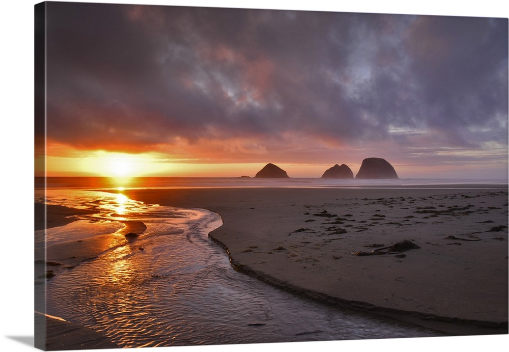 USA, Oregon, Oceanside. Sunset on Three Arch Rocks.