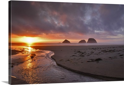Oregon, Oceanside. Sunset on Three Arch Rocks