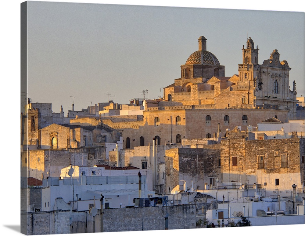 The picturesque old town of Ostuni in southern Italy, built on top of a hill and crowned by its Gothic Basilica or Cathedr...